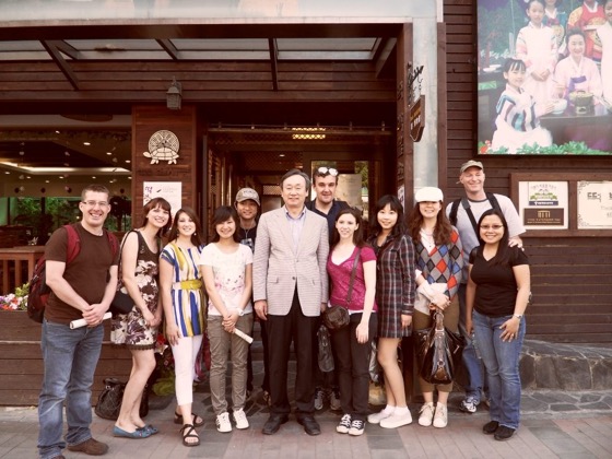 Group photo of guests gathered with their host